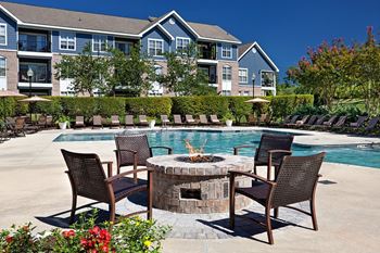 Pool with attached gas fire pit
